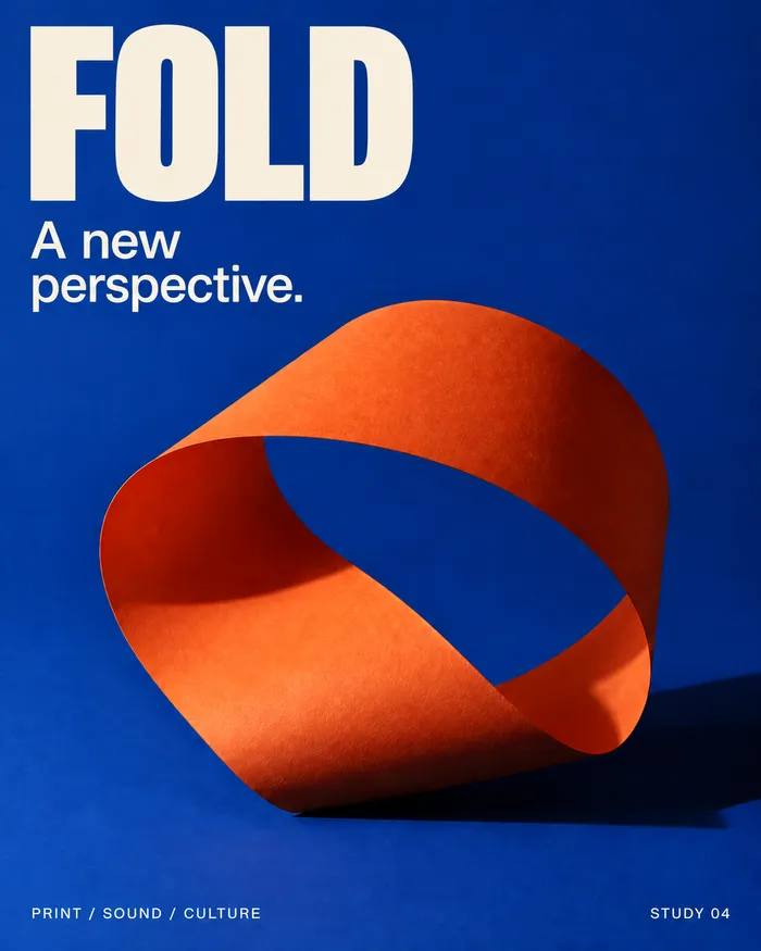 Fictional FOLD campaign: an orange paper ribbon against cobalt blue